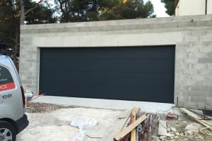 Installation porte de garage sectionnelle HORMANN 6m motorisée par SMP